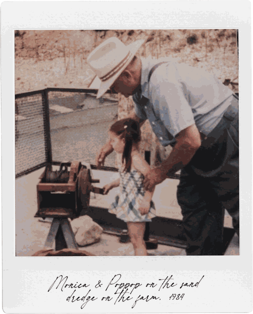 Monica as a child with her Poppop on the farm, 1984
