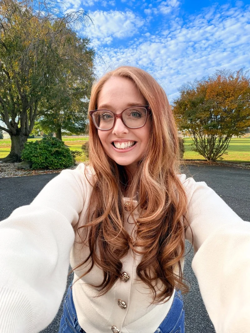 Dr. Monica Rysavy outside on her family farm in Delaware
